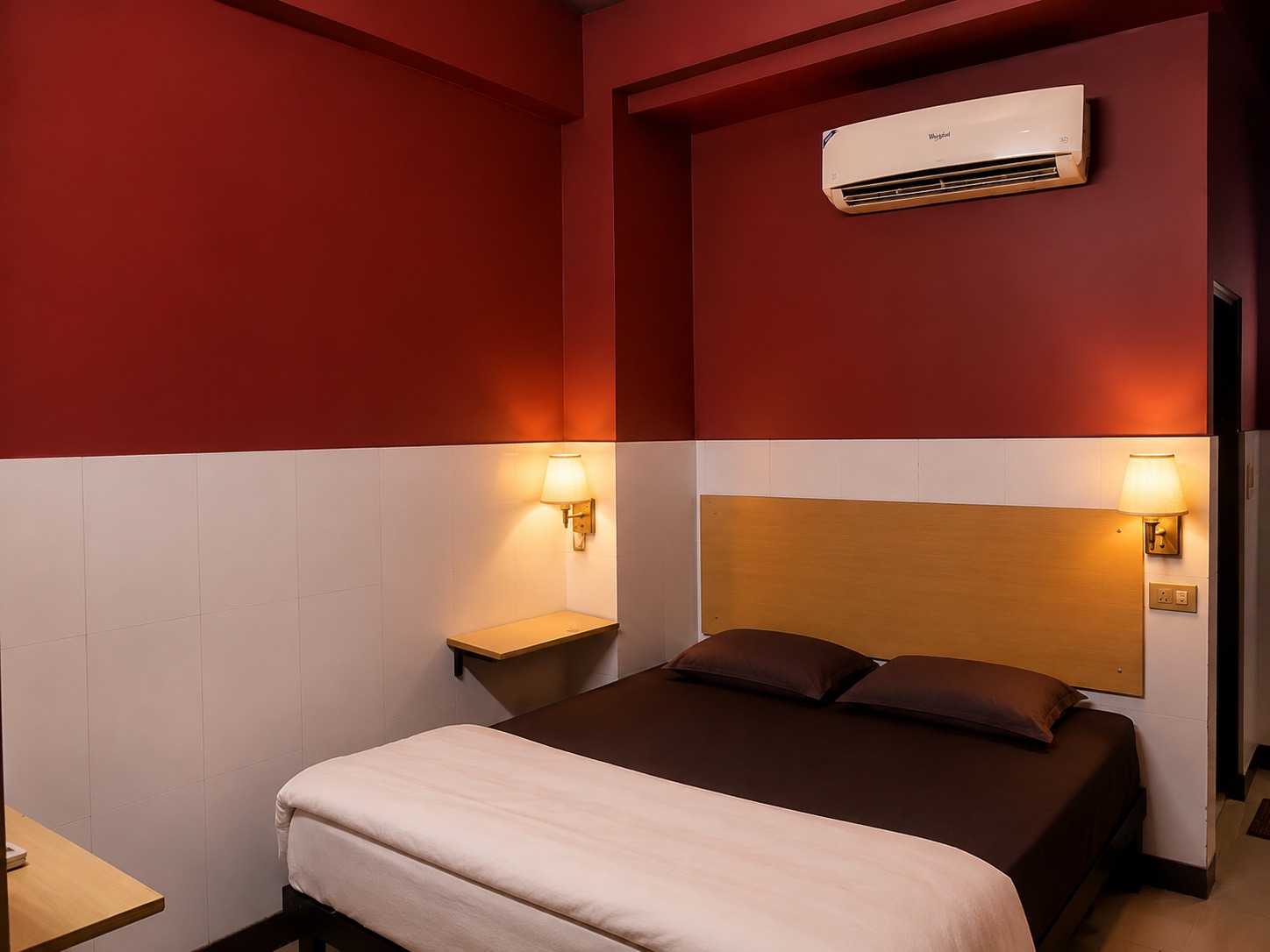 Classic room with a red upper wall and tiled lower wall