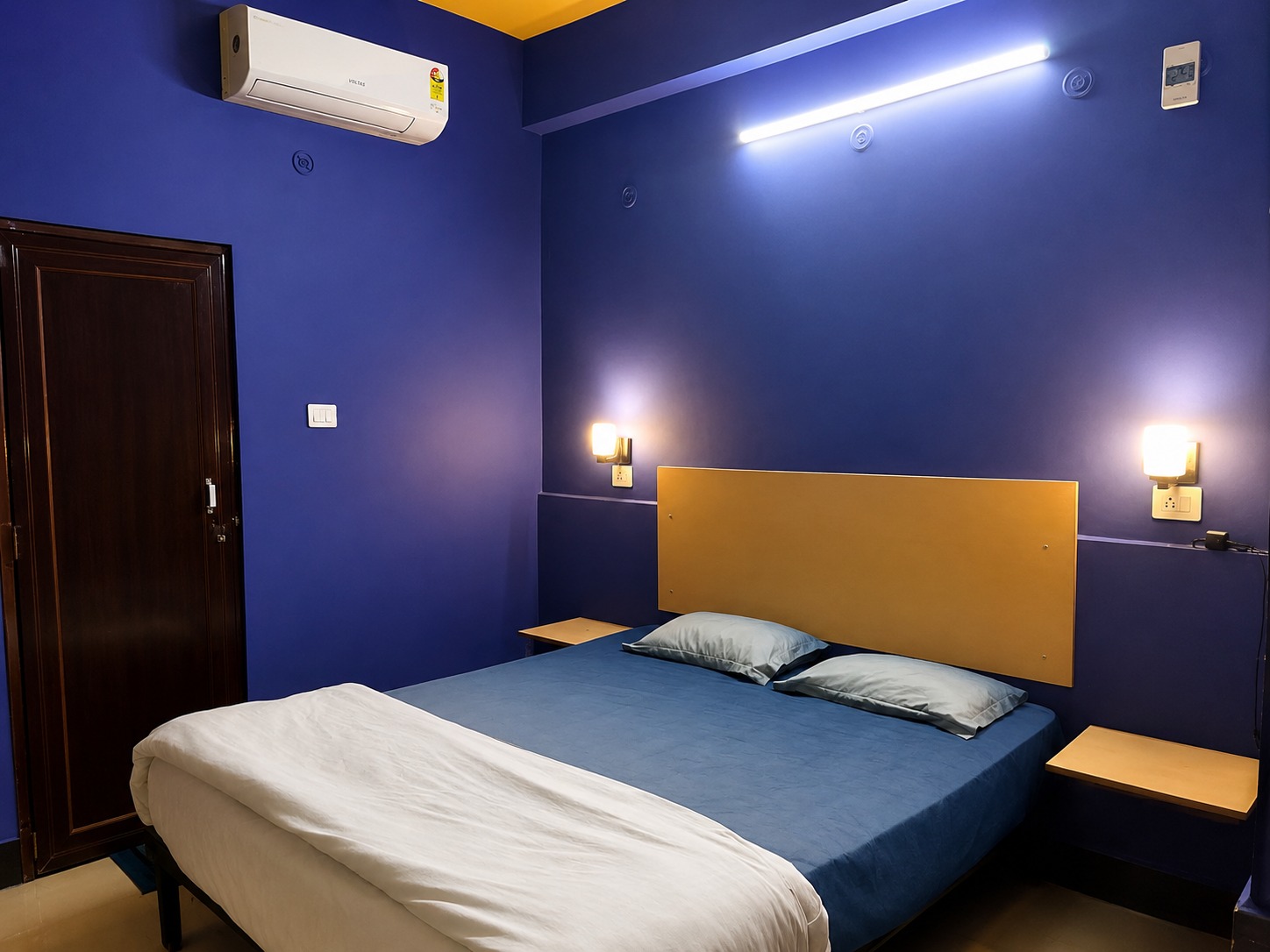 Delux room painted cobalt blue